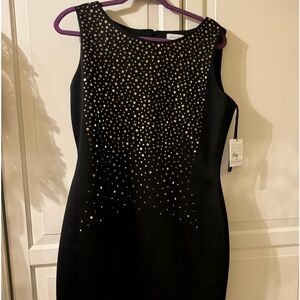 Calvin Klein black dress with gold accents. Size 14.